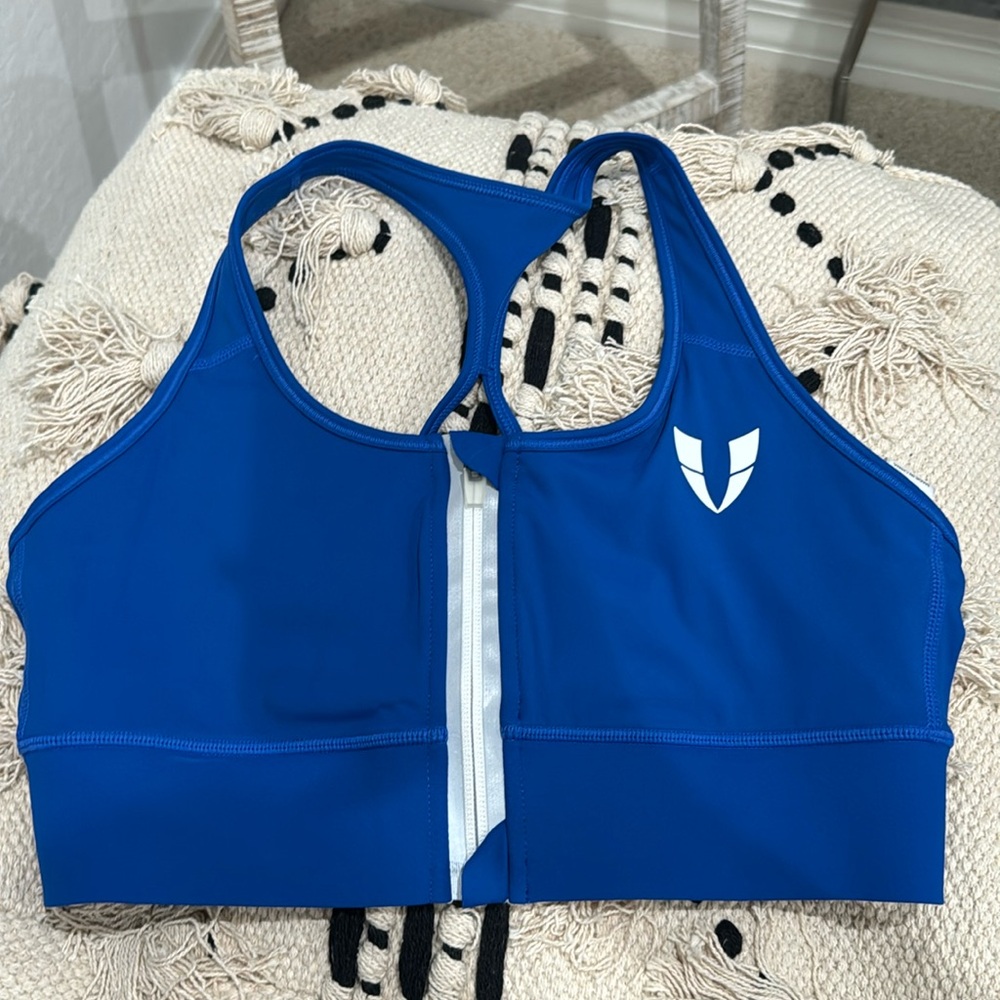 Blue and white Firmabs sports bra with front zipper. USA med (China size L)